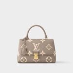 Madeleine MM Bicolor Monogram Empreinte Leather - Louis Vuitton