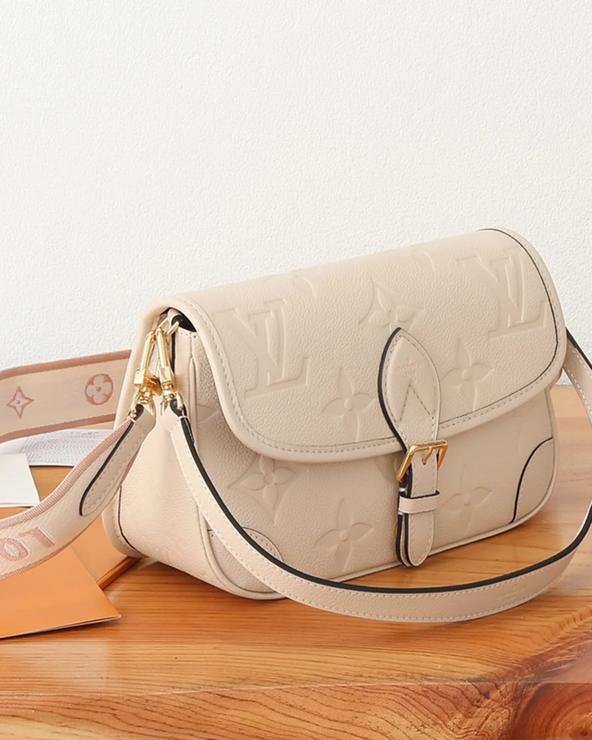 bagladt-signature-buckle-satchel-cream-embossed-leather-front3