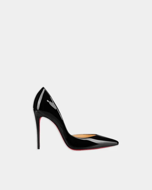 Iriza-inspired black patent stiletto pump with pointed toe, side view.