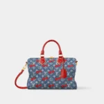 Louis Vuitton Speedy in monogram denim with cherry pattern, denim blue with red handles, front view Cherry Speedy 30 Denim