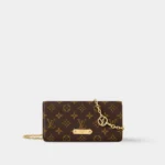 Wallet on chain in monogram coated canvas with gold-tone chain strap, front view.
