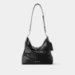 Signature Nomad Hobo bag in matte black embossed leather front view