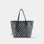 Bi-color embossed leather tote bag MM size black and white front view