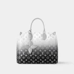Signature Box Tote MM bag in Giant and Reverse monogram canvas front view