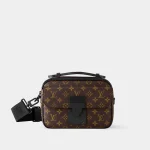 Signature Magnetic Lock Messenger bag in monogram macassar canvas front view