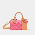 Signature Mini Boston Bag Nano size in sand toned monogram canvas front view