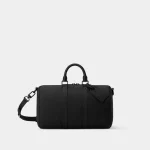 Signature Mini Boston Bag Nano size in sand toned monogram canvas front view