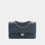 Signature Elongated Flap Bag East West style in spruce blue leather front view