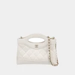 Signature Fold-Over Nano Tote 31 style in shiny black crumpled leather front view