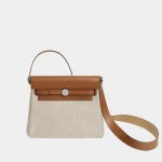 Signature Heritage Canvas Tote 30 in ecru toile and fauve leather front view