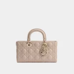 Signature Horizontal Top Handle D-Joy style bag in powder pink lambskin front view