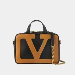 Signature Macro Stud Shoulder Bag Roman style in quilted nappa leather front view