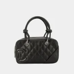 Signature Offset Logo Shoulder Bag Cambon style in black and white leather front view