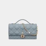 Signature Royal Flap Top Handle Mini bag in cherry red cannage lambskin front view