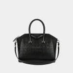 Signature Slouchy Biker Bag Medium in black tumbled leather front view