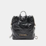 Signature Soft Drawstring Tote Mini in glossy black calfskin front view