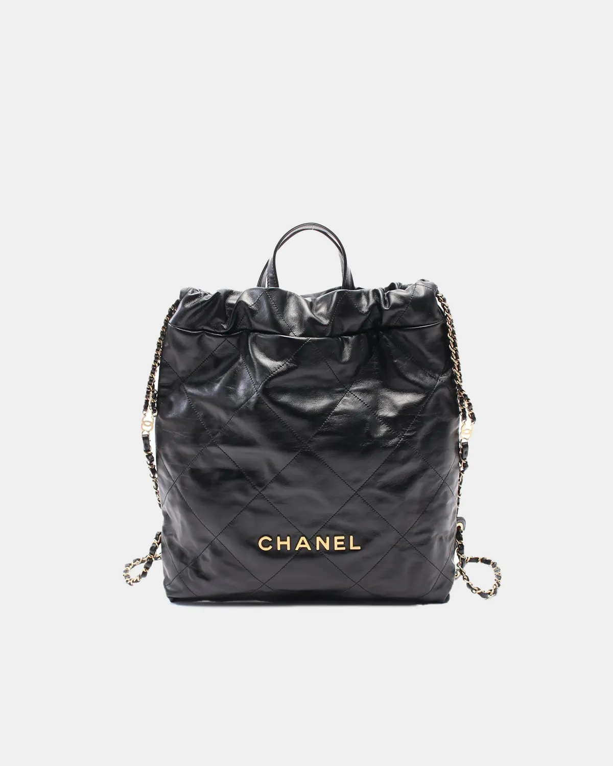 Signature Soft Drawstring Tote Mini in glossy black calfskin front view