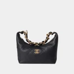 Signature Soft Half-Moon Hobo bag in black grained leather front view