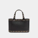 Signature Studded Mini Tote in grained leather front view