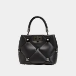 Signature Tonal Macro Stud Handle Bag in monochrome quilted nappa leather front view