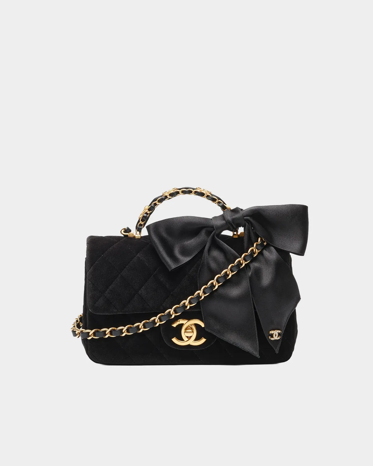 Signature Velvet Top Handle Mini bag in black velvet with gold hardware front view
